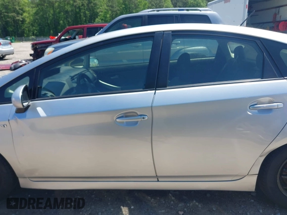 2015 Toyota Prius Four with VIN JTDKN3DU8F2000933, listed as a IAAI auction lot 42113155 with 212,443 mi miles and . Bid and sale history available at DreamBid. Image 14.