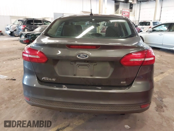2015 Ford Focus SE with VIN 1FADP3F2XFL201554, listed as a IAAI auction lot 41817418 with 101,938 mi miles. Bid and sale history available at carsss.com. Image 17.