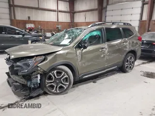 2023 Subaru Ascent Touring z VIN 4S4WMAWD7P3411589, wystawiony jako IAAI lot #42096301 z przebiegiem 41 811 mil mil oraz . Historia ofert i sprzedaży dostępna na DreamBid. Obrazek 2.