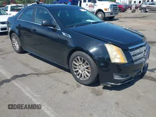 2011 Cadillac CTS with VIN 1G6DA5EY4B0154971, listed as a IAAI auction lot 42787151 with 133,372 mi miles and . Bid and sale history available at DreamBid. Image 1.