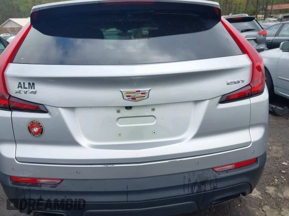 2019 Cadillac XT4 FWD Luxury z VIN 1GYAZAR43KF160132, wystawiony jako IAAI lot #41941512 z przebiegiem 68 835 mil mil oraz . Historia ofert i sprzedaży dostępna na DreamBid. Obrazek 16.