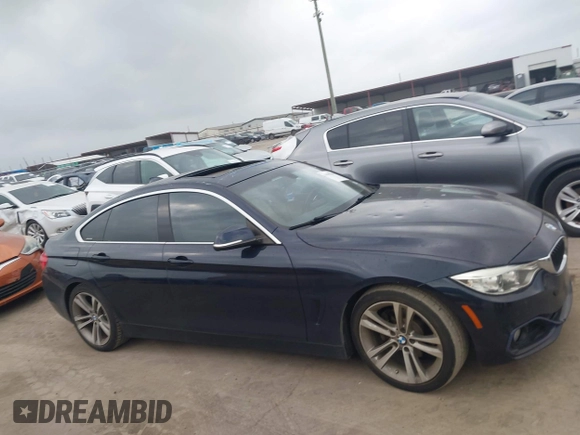 2016 BMW 4 Series 428i z VIN WBA4A9C5XGGL89545, wystawiony jako IAAI lot #41959630 z przebiegiem 61 908 mil mil oraz . Historia ofert i sprzedaży dostępna na DreamBid. Obrazek 13.