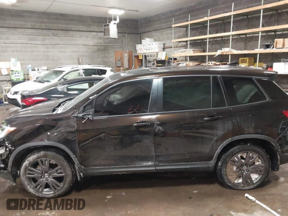 2020 Honda Passport EX-L with VIN 5FNYF8H53LB013931, listed as a IAAI auction lot 41614095 with 68,537 mi miles and . Bid and sale history available at DreamBid. Image 14.