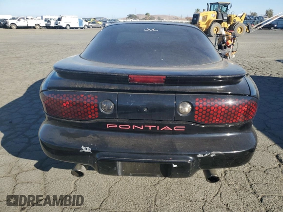 1999 Pontiac Firebird Firebird z VIN 2G2FS22K6X2208489, wystawiony jako Copart lot #79930994 z przebiegiem 181 964 mil mil oraz Czysty tytuł • Clean title. Historia ofert i sprzedaży dostępna na DreamBid. Obrazek 6.