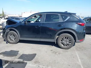 2017 Mazda CX-5 Touring with VIN JM3KFACL2H0146213, listed as a IAAI auction lot 41626112 with 77,829 mi miles and . Bid and sale history available at carsss.com. Image 14.