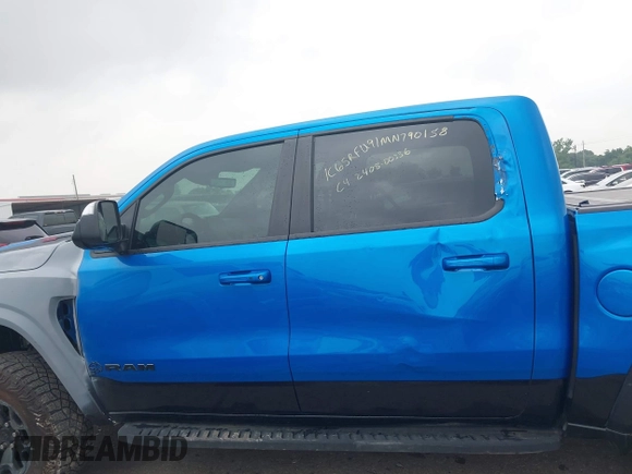 2021 Ram 1500 TRX with VIN 1C6SRFU91MN790158, listed as a IAAI auction lot 42115253 with 30,969 mi miles and . Bid and sale history available at DreamBid. Image 14.