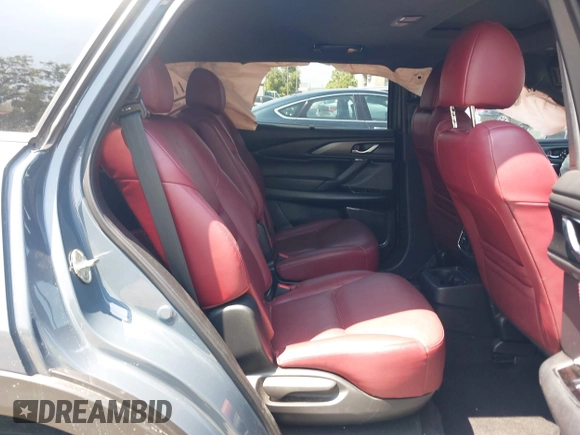 2022 Mazda CX-9 Grand Touring with VIN JM3TCBDY1N0611766, listed as a IAAI auction lot 42452059 with 60,755 mi miles and . Bid and sale history available at DreamBid. Image 8.