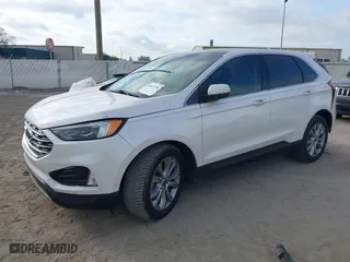 2019 Ford Edge Titanium with VIN 2FMPK3K93KBB11919, listed as a IAAI auction lot 41613148 with 61,053 mi miles. Bid and sale history available at carsss.com. Image 2.