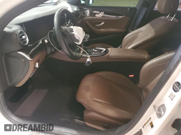 2018 Mercedes-Benz E 300 with VIN WDDZF4JB7JA314257, listed as a Copart auction lot 54071805 with 76,658 mi miles and Salvage title. Bid and sale history available at DreamBid. Image 7.