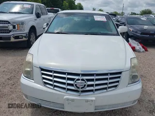 2006 Cadillac DTS 1SC z VIN 1G6KD57Y46U180755, wystawiony jako IAAI lot #42299416 z przebiegiem 109 532 mil mil oraz . Historia ofert i sprzedaży dostępna na DreamBid. Obrazek 6.
