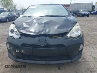 2014 Toyota Prius One with VIN JTDKDTB32E1074592, listed as a IAAI auction lot 42078851 with Not Provided miles and . Bid and sale history available at DreamBid. Image 11.