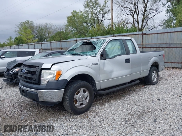 2014 Ford F-150 XL with VIN 1FTEX1EM2EFB00107, listed as a IAAI auction lot 40443721 with 121,674 mi miles and . Bid and sale history available at carsss.com. Image 2.