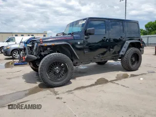 2014 Jeep Wrangler Unlimited Rubicon z VIN 1C4HJWFG1EL156853, wystawiony jako Copart lot #58496795 z przebiegiem 112 073 mil mil oraz Szkoda całkowita • Salvage title. Historia ofert i sprzedaży dostępna na DreamBid. Obrazek 1.
