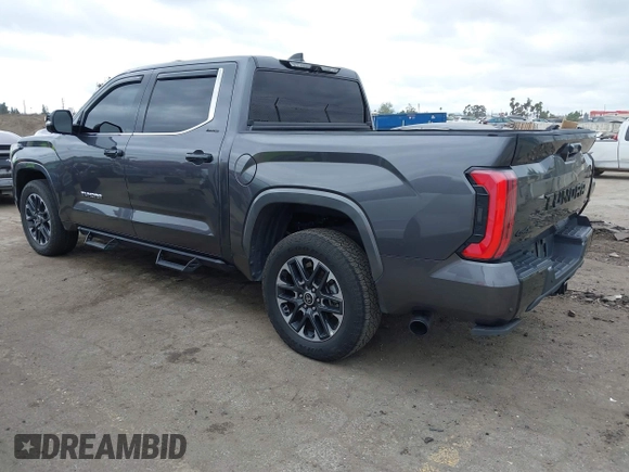 2023 Toyota Tundra Limited Hybrid with VIN 5TFJC5DB7PX021014, listed as a IAAI auction lot 42067753 with 64,991 mi miles and . Bid and sale history available at DreamBid. Image 3.