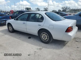 1995 Nissan Maxima GLE с VIN JN1CA21D6ST059369, выставлен на аукционе Copart как лот 74794884 с пробегом 246 806 миль миль и Списание • Salvage title. История ставок и продаж доступна на DreamBid. Изображение 2.