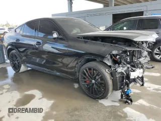 2023 BMW X6 M50i with VIN 5UXCY8C01P9S00552, listed as a Copart auction lot 84193154 with 16,590 mi miles and Salvage Title. Bid and sale history available at carsss.com. Image 4.