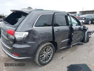 2018 Jeep Grand Cherokee Summit with VIN 1C4RJFJT1JC370907, listed as a IAAI auction lot 41944933 with 110,597 mi miles and . Bid and sale history available at DreamBid. Image 4.