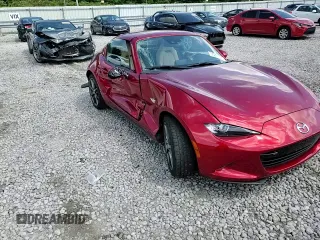 2020 Mazda MX-5 Miata Grand Touring z VIN JM1NDAM70L0414102, wystawiony jako Copart lot #55261575 z przebiegiem 70 157 mil mil oraz Szkoda całkowita • Salvage title. Historia ofert i sprzedaży dostępna na DreamBid. Obrazek 13.