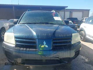 2004 Mitsubishi Endeavor LS with VIN 4A4MM21S54E024328, listed as a IAAI auction lot 41623681 with 300,550 mi miles. Bid and sale history available at carsss.com. Image 6.