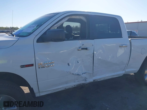 2015 Ram 1500 Big Horn z VIN 1C6RR7TM9FS740459, wystawiony jako IAAI lot #41422104 z przebiegiem 55 396 mil mil oraz . Historia ofert i sprzedaży dostępna na DreamBid. Obrazek 6.