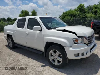 2012 Honda Ridgeline RTL with VIN 5FPYK1F56CB002709, listed as a Copart auction lot 62642495 with 116,416 mi miles and Salvage title. Bid and sale history available at DreamBid. Image 4.