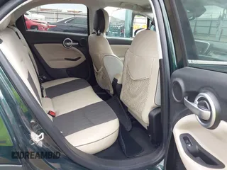 2016 FIAT 500X Lounge z VIN ZFBCFYDT3GP393494, wystawiony jako IAAI lot #42208957 z przebiegiem 93 462 mil mil oraz . Historia ofert i sprzedaży dostępna na DreamBid. Obrazek 8.