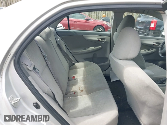 2009 Toyota Corolla with VIN 1NXBU40E89Z128911, listed as a IAAI auction lot 42714988 with 215,416 mi miles and . Bid and sale history available at DreamBid. Image 8.