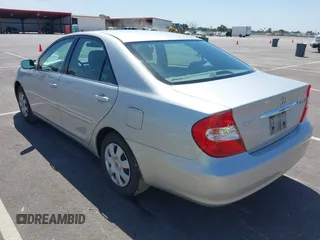 2004 Toyota Camry LE with VIN 4T1BE32K74U300025, listed as a IAAI auction lot 42035954 with 115,203 mi miles. Bid and sale history available at carsss.com. Image 3.