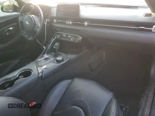 2022 Toyota GR Supra 3.0 with VIN WZ1DB0C04NW052244, listed as a Copart auction lot 82870654 with 63,592 mi miles and Salvage Title. Bid and sale history available at carsss.com. Image 8.