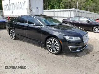 2019 Lincoln MKZ Reserve II z VIN 3LN6L5E98KR617764, wystawiony jako Copart lot #53246005 z przebiegiem 108 017 mil mil oraz Tytuł czysty. Historia ofert i sprzedaży dostępna na DreamBid. Obrazek 4.