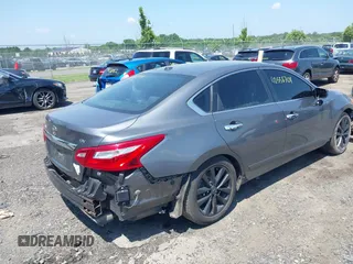 2016 Nissan Altima SR with VIN 1N4AL3AP1GC204037, listed as a IAAI auction lot 42558701 with 82,002 mi miles and . Bid and sale history available at DreamBid. Image 4.