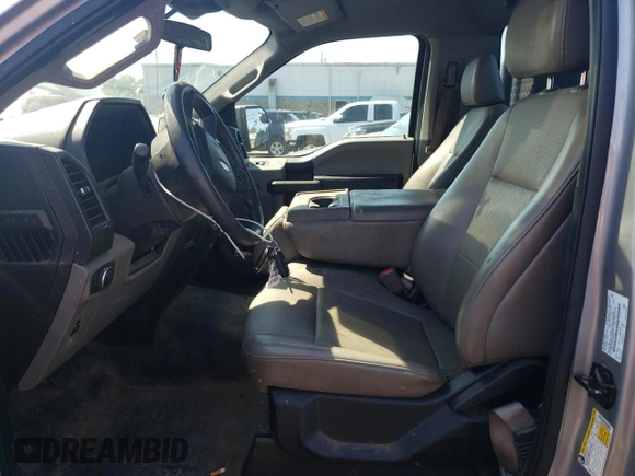 2020 Ford F-150 XL with VIN 1FTMF1C50LKE01683, listed as a Copart auction lot 70235144 with 57,325 mi miles and Salvage Title. Bid and sale history available at carsss.com. Image 7.