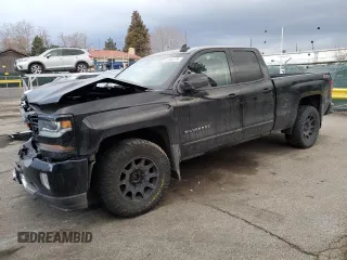 2017 Chevrolet Silverado 1500 LT with VIN 1GCVKREC1HZ225218, listed as a Copart auction lot 48948735 with 114,627 mi miles and Salvage Title. Bid and sale history available at DreamBid. Image 1.