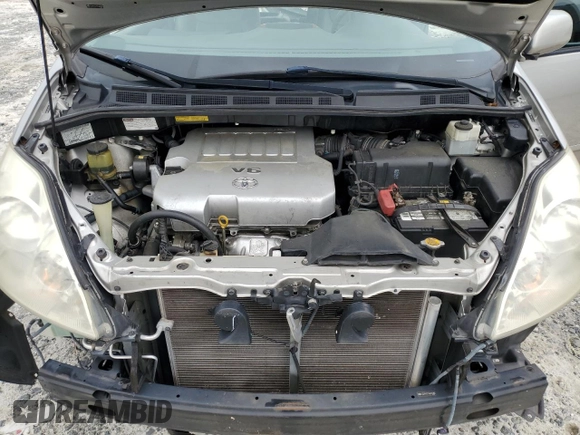 2010 Toyota Sienna XLE with VIN 5TDYK4CC1AS322395, listed as a Copart auction lot 60520215 with 148,725 mi miles and Salvage title. Bid and sale history available at DreamBid. Image 12.