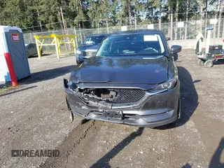 2019 Mazda CX-5 Grand Touring with VIN JM3KFBDM3K1677208, listed as a IAAI auction lot 41929299 with 58,163 mi miles. Bid and sale history available at carsss.com. Image 12.