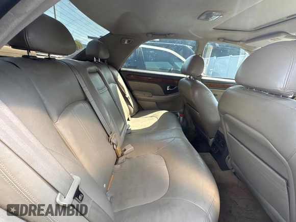 2005 Hyundai XG z VIN KMHFU45E95A381631, wystawiony jako Copart lot #57705005 z przebiegiem 202 730 mil mil oraz Tytuł czysty. Historia ofert i sprzedaży dostępna na DreamBid. Obrazek 6.