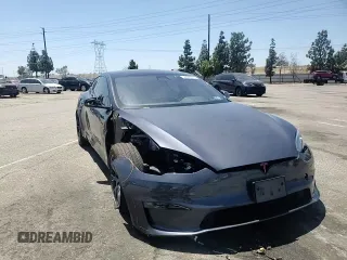 2022 Tesla Model S z VIN 5YJSA1E53NF491494, wystawiony jako Copart lot #56483015 z przebiegiem 31 507 mil mil oraz Szkoda całkowita • Salvage title. Historia ofert i sprzedaży dostępna na DreamBid. Obrazek 14.