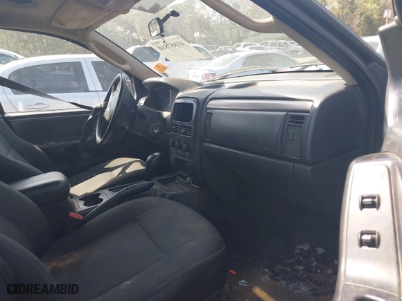 2004 Jeep Grand Cherokee Laredo with VIN 1J4GX48S14C176318, listed as a IAAI auction lot 41887810 with 1 mi miles. Bid and sale history available at carsss.com. Image 5.