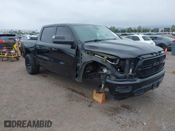 2019 Ram 1500 Big Horn z VIN 1C6RREFT4KN769609, wystawiony jako IAAI lot #42401229 z przebiegiem 46 049 mil mil oraz . Historia ofert i sprzedaży dostępna na DreamBid. Obrazek 1.