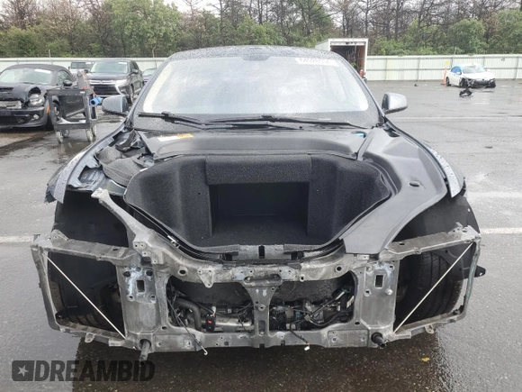2014 Tesla Model S 60 with VIN 5YJSA1H14EFP28471, listed as a Copart auction lot 64928534 with 99,442 mi miles and Clean Title. Bid and sale history available at DreamBid. Image 5.