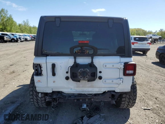 2018 Jeep Wrangler Unlimited Sport S with VIN 1C4HJXDN4JW240844, listed as a Copart auction lot 55578405 with 70,369 mi miles and Salvage title. Bid and sale history available at DreamBid. Image 6.