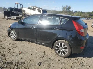 2015 Hyundai Accent Sport with VIN KMHCU5AE6FU234035, listed as a Copart auction lot 74429244 with 228,512 mi miles and Salvage Title. Bid and sale history available at carsss.com. Image 2.