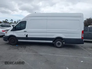 2020 Ford Transit Cargo with VIN 1FTBW3XG2LKB18281, listed as a IAAI auction lot 42022187 with 84,323 mi miles. Bid and sale history available at carsss.com. Image 14.