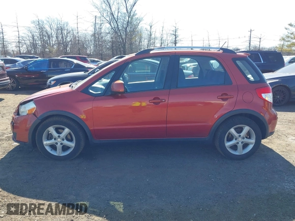 2009 Suzuki SX4 Man Touring Pkg AWD with VIN JS2YB417496201691, listed as a IAAI auction lot 41741746 with 172,369 mi miles. Bid and sale history available at carsss.com. Image 14.