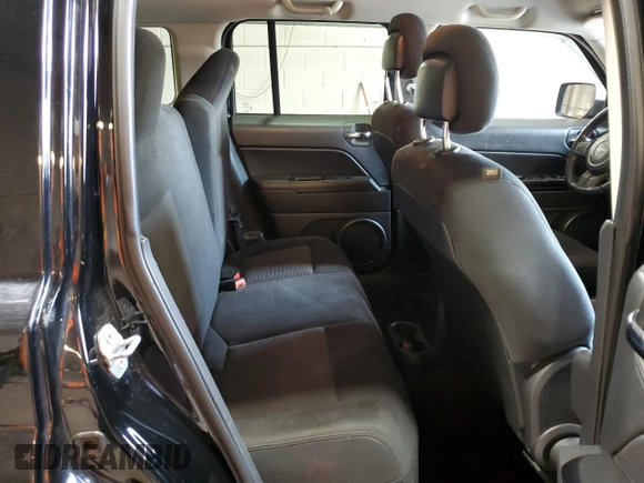 2014 Jeep Patriot Latitude with VIN 1C4NJPFB0ED890696, listed as a Copart auction lot 55581825 with 70,030 mi miles and Salvage title. Bid and sale history available at DreamBid. Image 11.