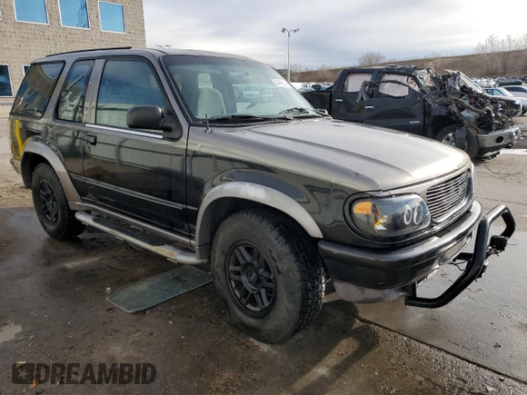 1997 Ford Explorer Sport z VIN 1FMDU24E2VUB68077, wystawiony jako Copart lot #82446534 z przebiegiem 196 458 mil mil oraz Szkoda całkowita • Salvage title. Historia ofert i sprzedaży dostępna na DreamBid. Obrazek 4.