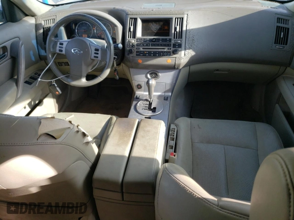 2005 Infiniti FX35 with VIN JNRAS08U65X109597, listed as a Copart auction lot 74576584 with 198,733 mi miles and Salvage Title. Bid and sale history available at carsss.com. Image 8.