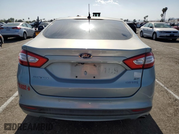 2014 Ford Fusion SE Hybrid with VIN 3FA6P0LU2ER159782, listed as a Copart auction lot 54444274 with 255,212 mi miles and Salvage Title. Bid and sale history available at DreamBid. Image 6.