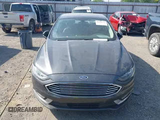 2018 Ford Fusion SE with VIN 3FA6P0HD2JR253714, listed as a IAAI auction lot 42059879 with 115,995 mi miles and . Bid and sale history available at DreamBid. Image 6.