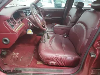1995 Lincoln Town Car Signature with VIN 1LNLM82W2SY713693, listed as a Copart auction lot 75430484 with 156,859 mi miles and Salvage Title. Bid and sale history available at carsss.com. Image 7.